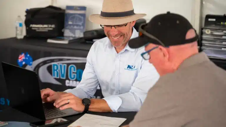 National Leisure Finance assisting a customer at a caravan and outdoor living expo